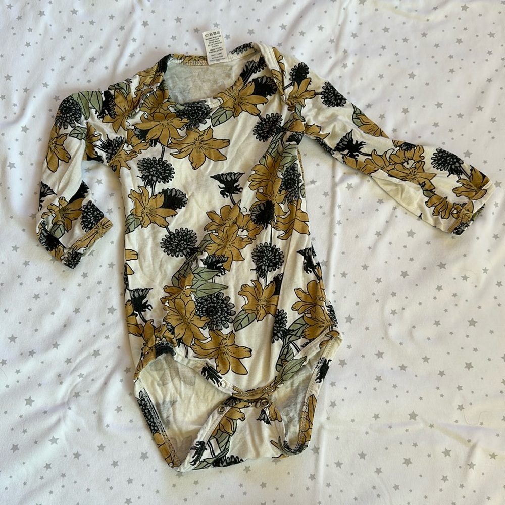 Kate Quinn flowers onesie